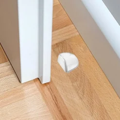Fermaporta adesivo in plastica trasparente FP 55 TRS
